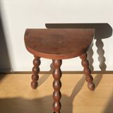 Turned wooden tripod stool