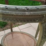 Old oval table with marble top, Louis XVI style