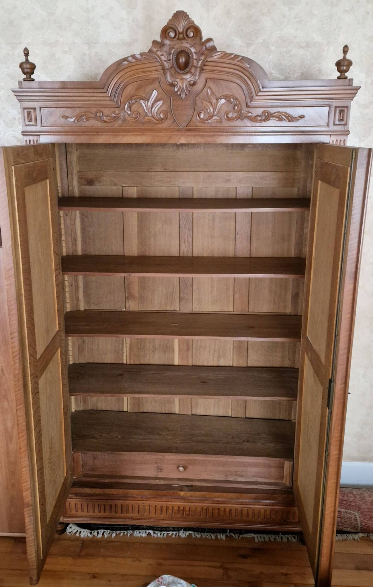 Large antique wardrobe in the Henri II style made of oak and walnut with bevelled mirrors.