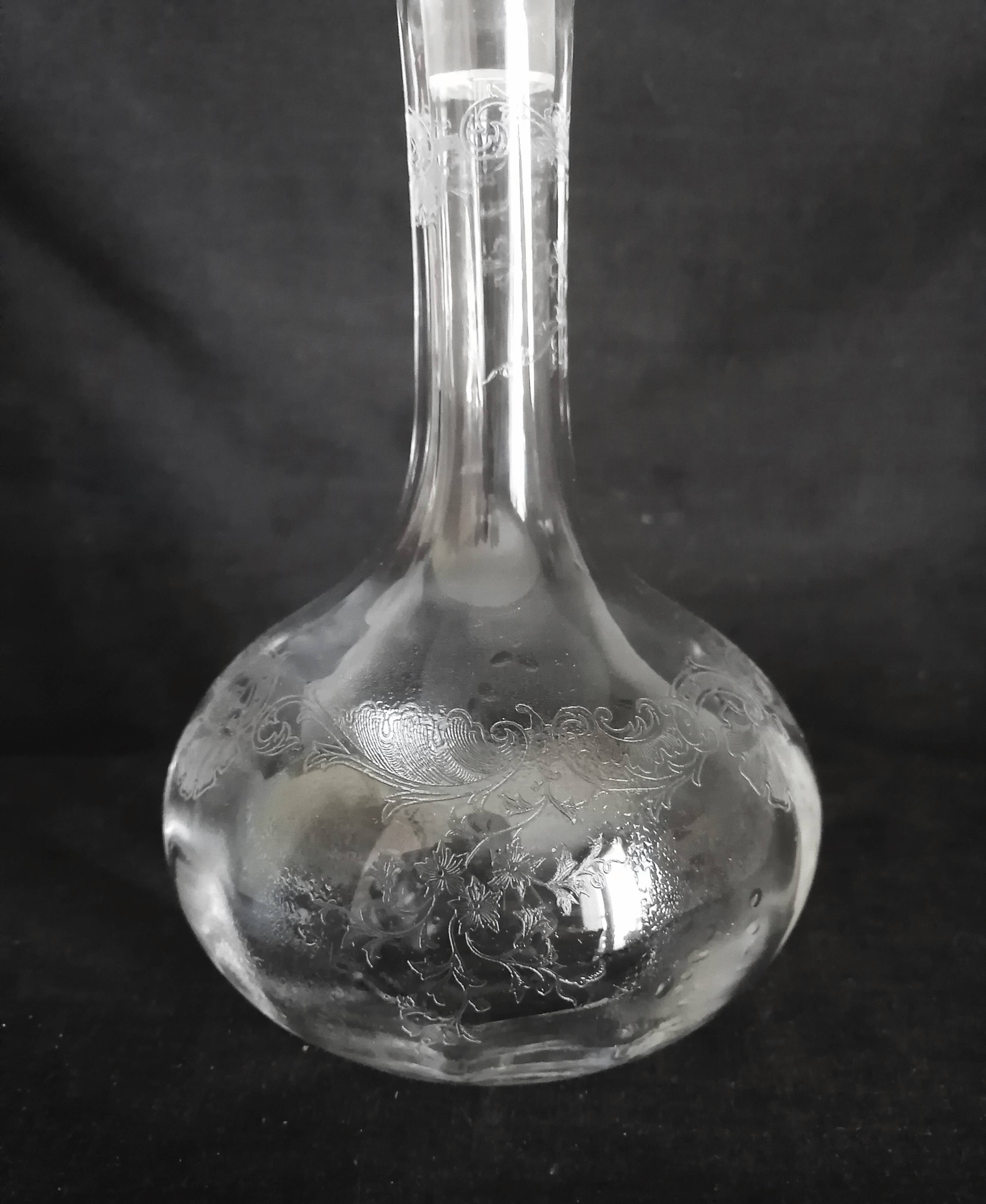 9 crystal white wine glasses from St. Louis model Cléo and their decanter.