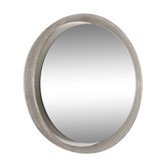 Bright round mirror in plexiglass
