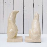 Cracked ceramic bookends with a couple of bears
