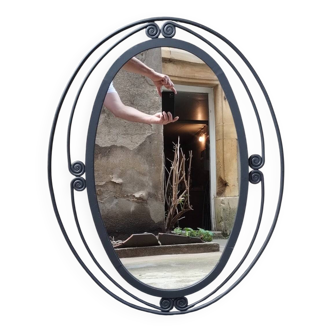 Miroir ovale vintage en fer forgé à décor de spirales