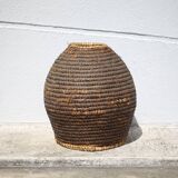 Old basket, burgundy straw and bramble, woven basket, interior decoration, pantry, flowerpot