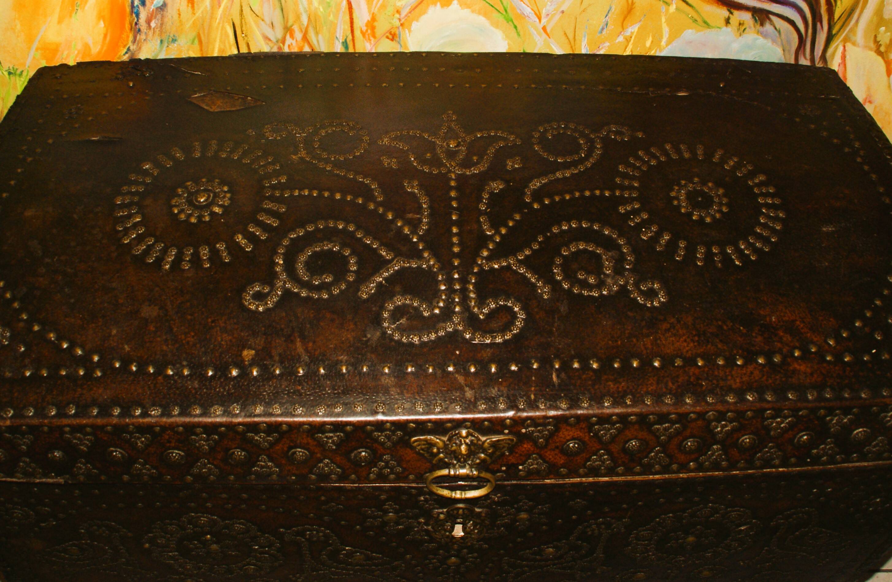 17th century studded leather travel trunk, richly decorated
