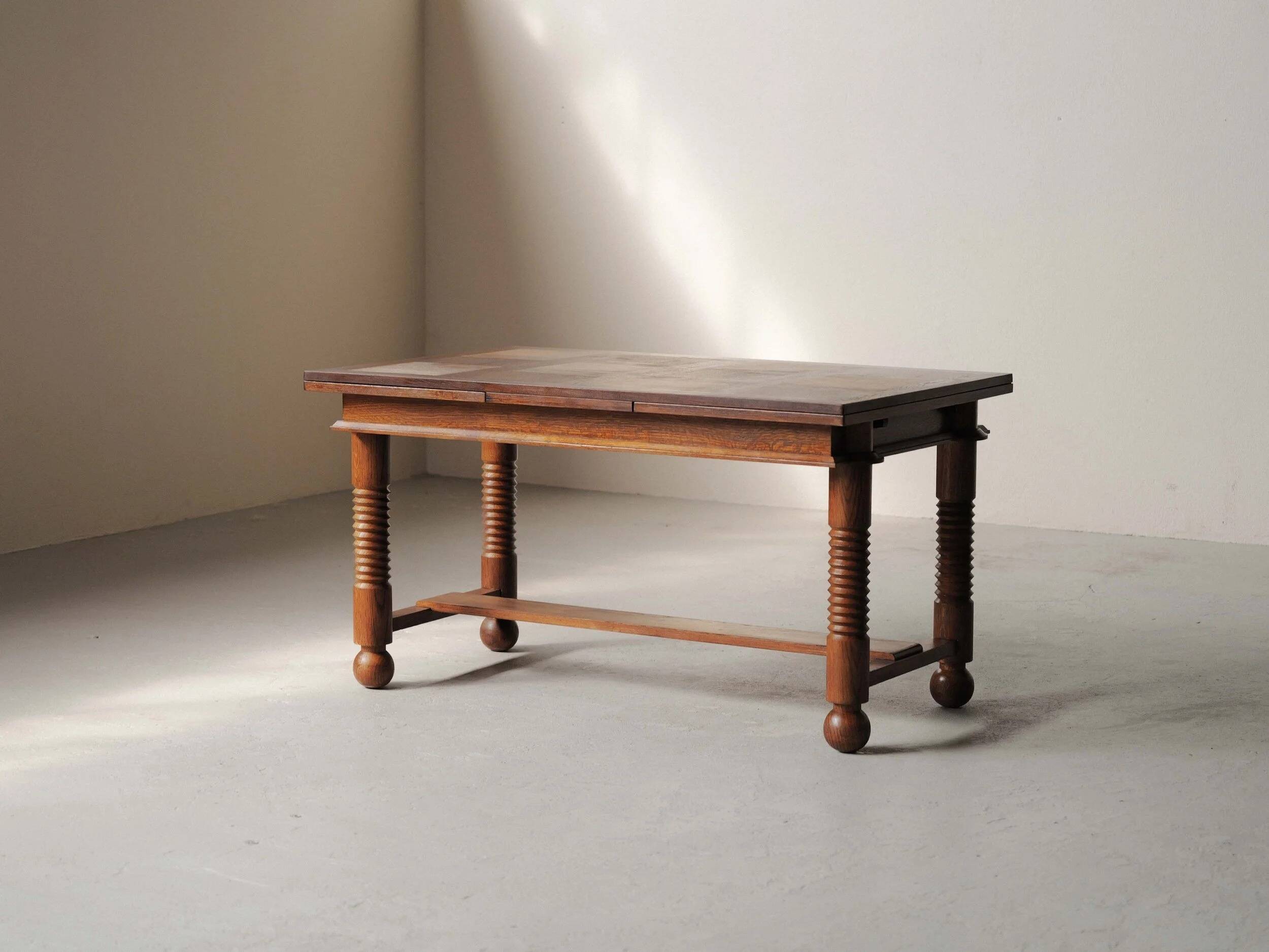 Modernist oak dining table, France, 1940–1950