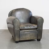 Sheepskin design armchair in a beautiful deep dark color
