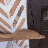 Old sandblasted wooden pediment