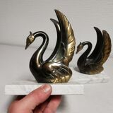 Pair of ancient zoomorphic bookends, swan statues
