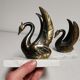 Pair of ancient zoomorphic bookends, swan statues