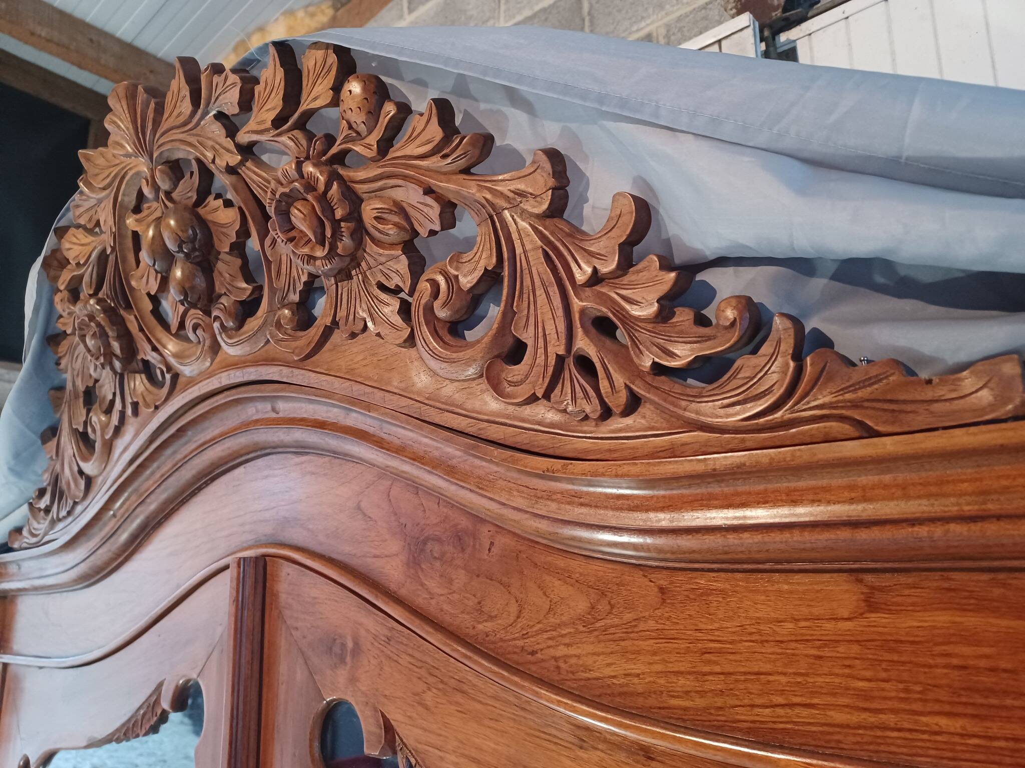 Large glass and carved cabinet