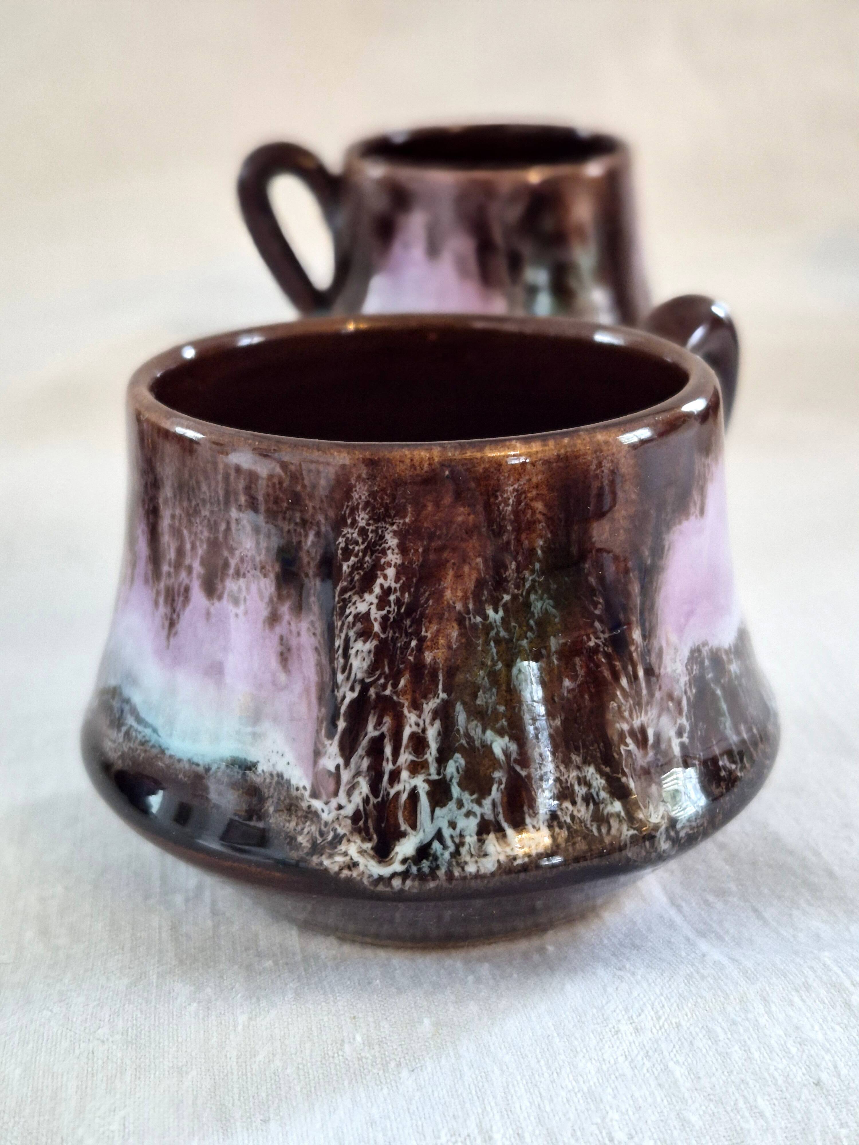 Six cups and saucers Vallauris glazed ceramic in brown and old pink.