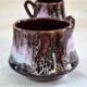 Six cups and saucers Vallauris glazed ceramic in brown and old pink.
