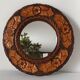 Round vintage carved wooden mirror