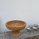 Fruit bowl on stand in woven rattan