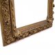 Miroir ancien dans un cadre richement décoré, France.