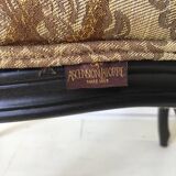 Black baroque armchair with fabric designed by wildlife by Ascension Latorre, Spain