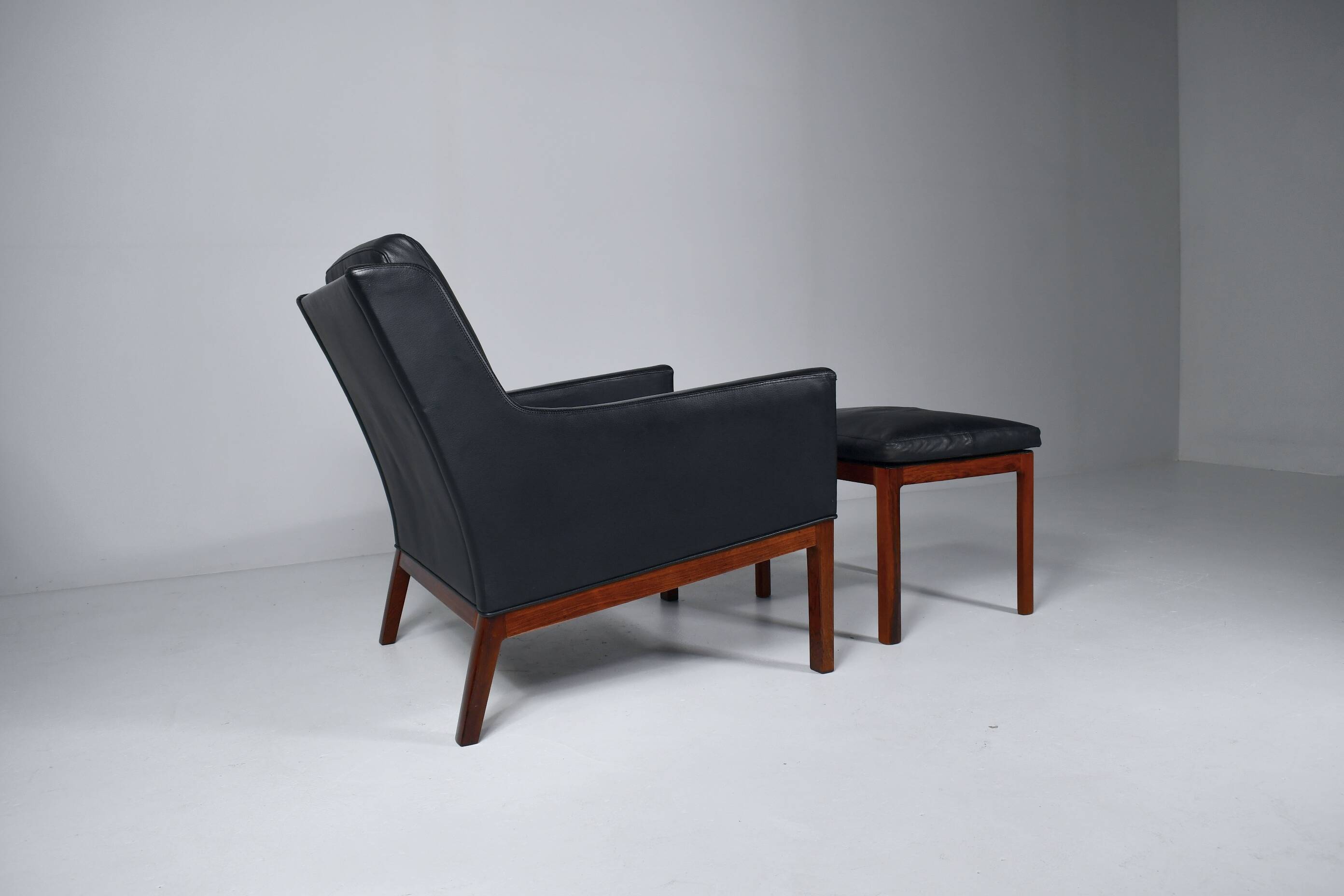 Leather armchair and footstool by Kai Lyngfeldt-Larsen. Denmark 1960s