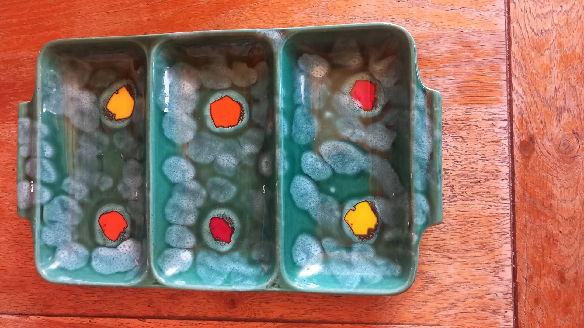 Glazed ceramic dish with compartments attributed to Poët-Laval.