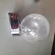 Pair of vintage wall lights in chrome metal with bubbled glass globes.