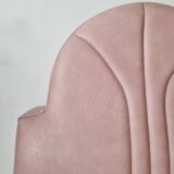 Single bar stool in pink stitched faux leather.