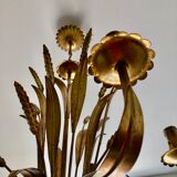 Golden suspension 5 fires with a bouquet of ears of wheat