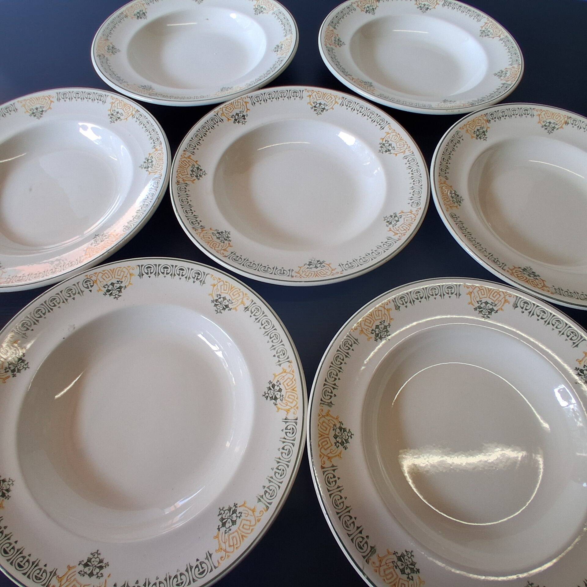 Set of 7 antique deep plates from Longwy, "Savigny" model, in good condition.