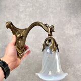 Art Nouveau wall sconces with opalescent iridescent glass