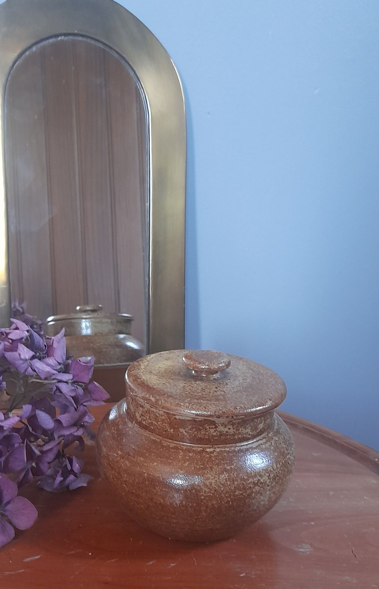 Old salt pot in sandstone, with lid