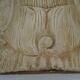 Deux ornements d'applique en bois sculpté et laqué crème,  représentant des cygnes