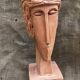 Buste de femme en terre cuite