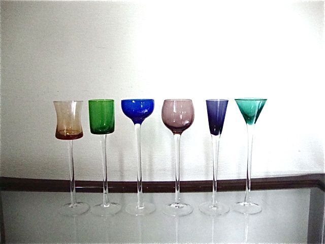 6 colorful chalices high on foot