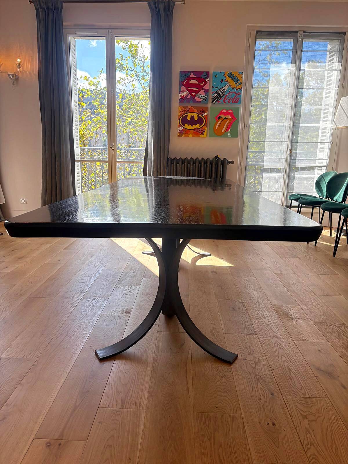 Large dining table in BS Style made of black oak and iron.