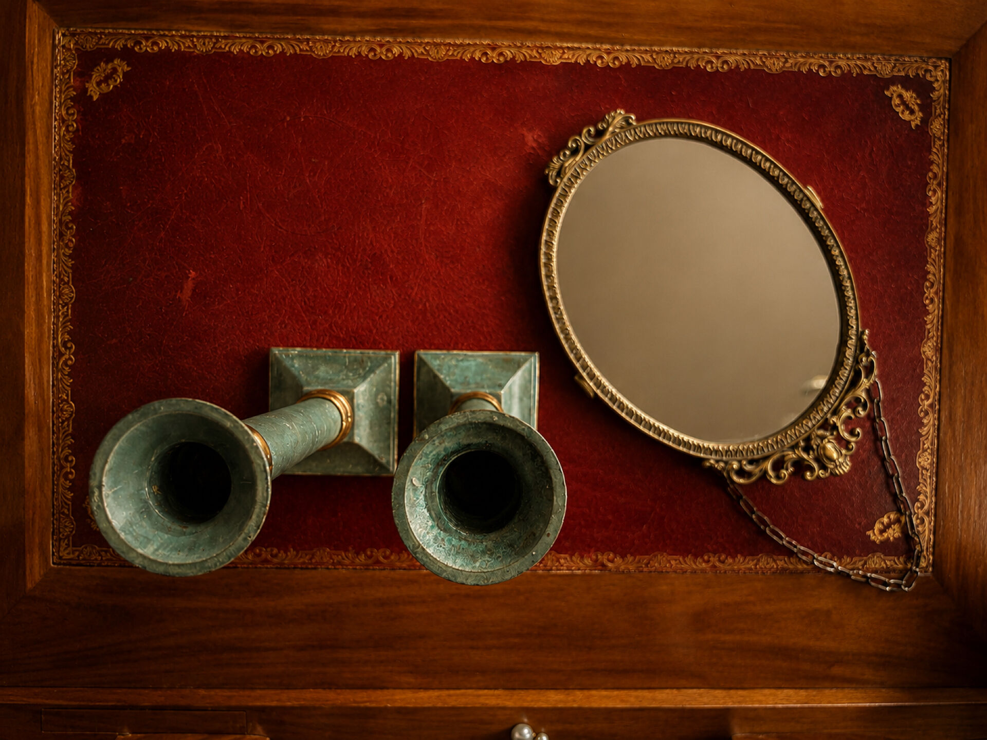 Exceptional pair of large candlesticks in patinated greenish-blue brass.
