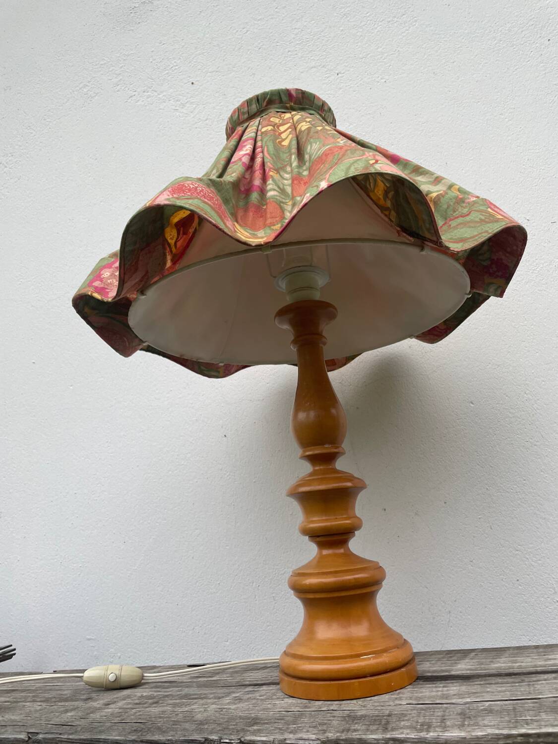 Turned wood lamp with flower shade
