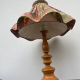 Turned wood lamp with flower shade