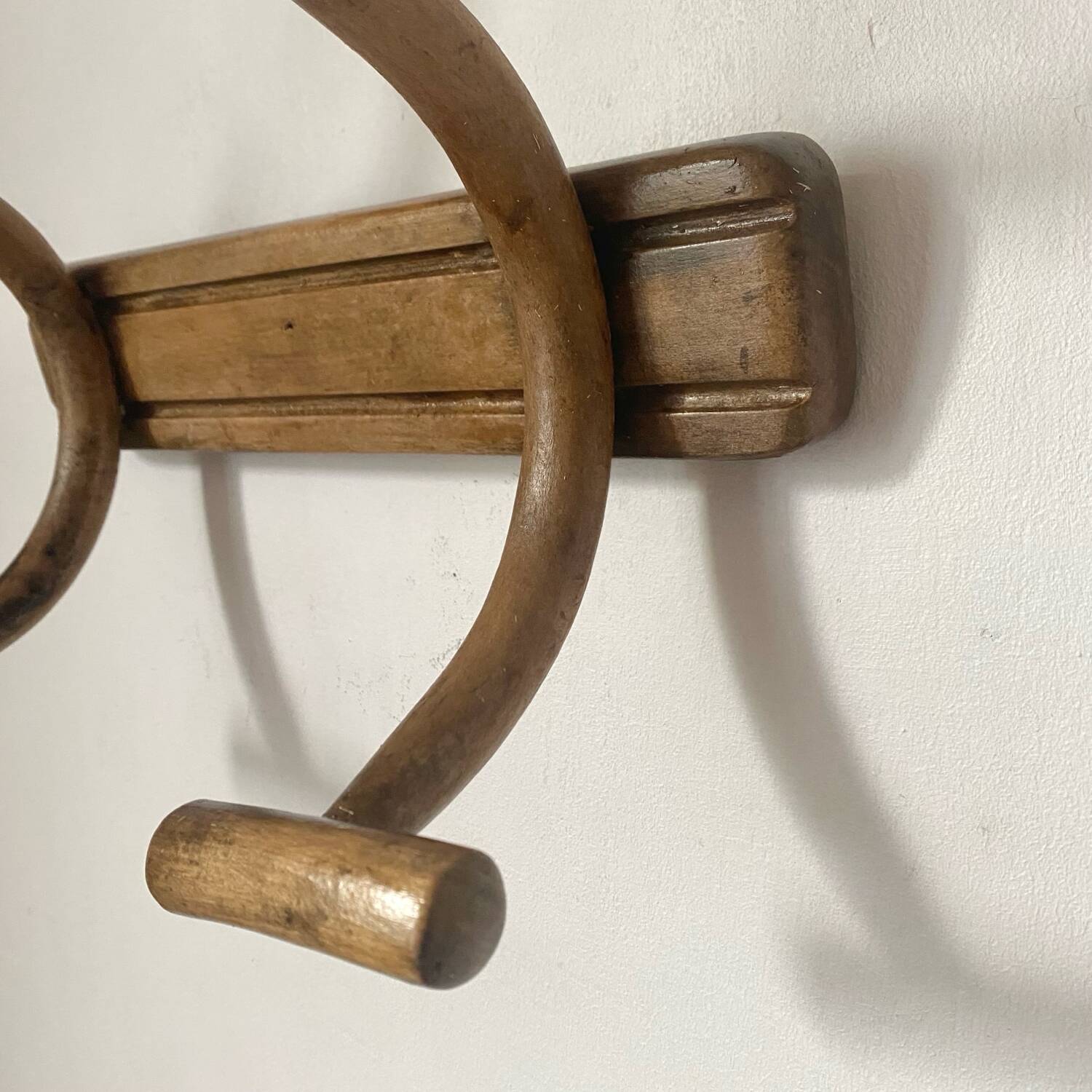 Curved wooden coat rack from the early 20th century