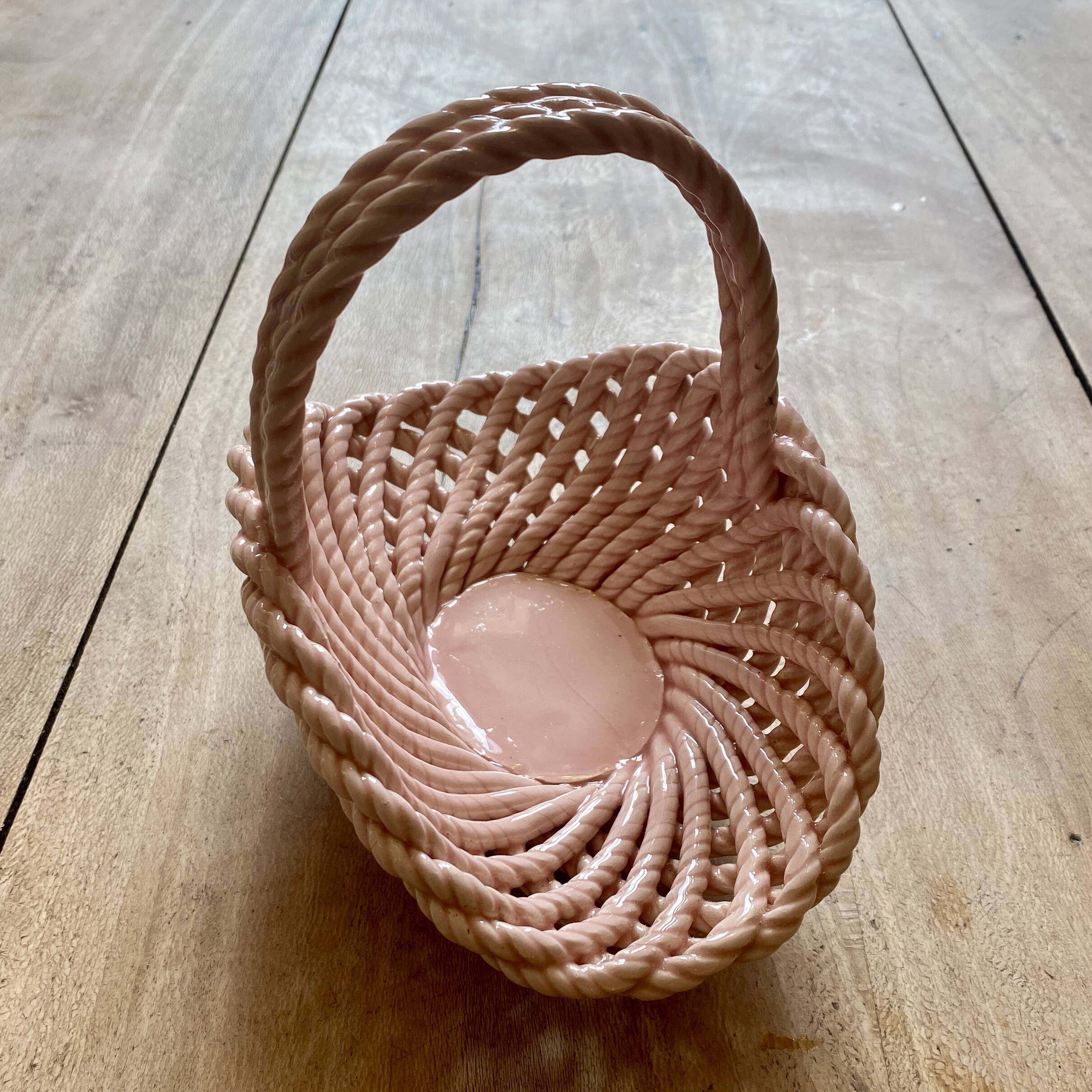 Vintage pink woven ceramic basket