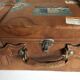 suitcase of leather with labels of palaces