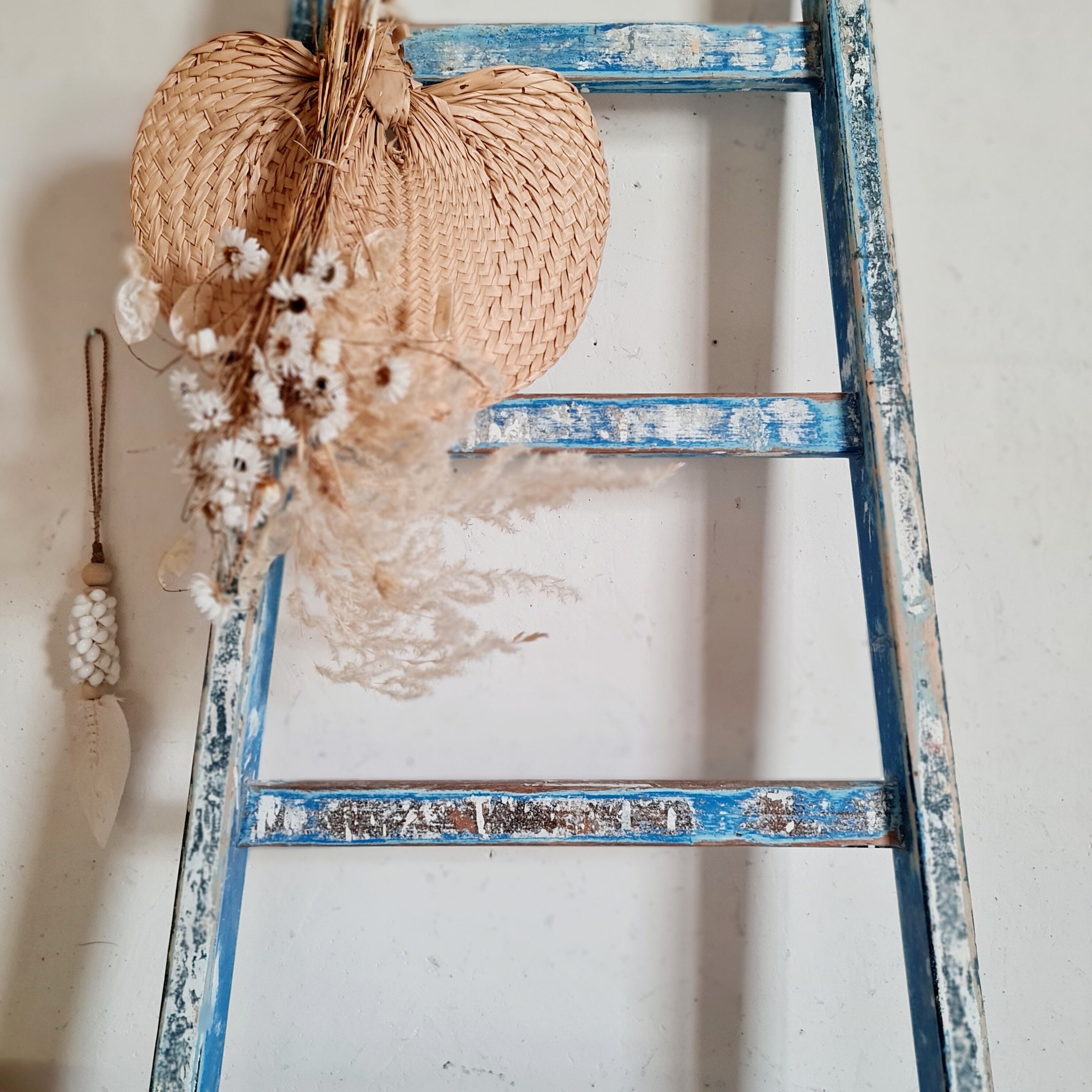 Old blue wooden ladder