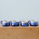 Service of 4 blue ceramic cups and saucers from the 1950s