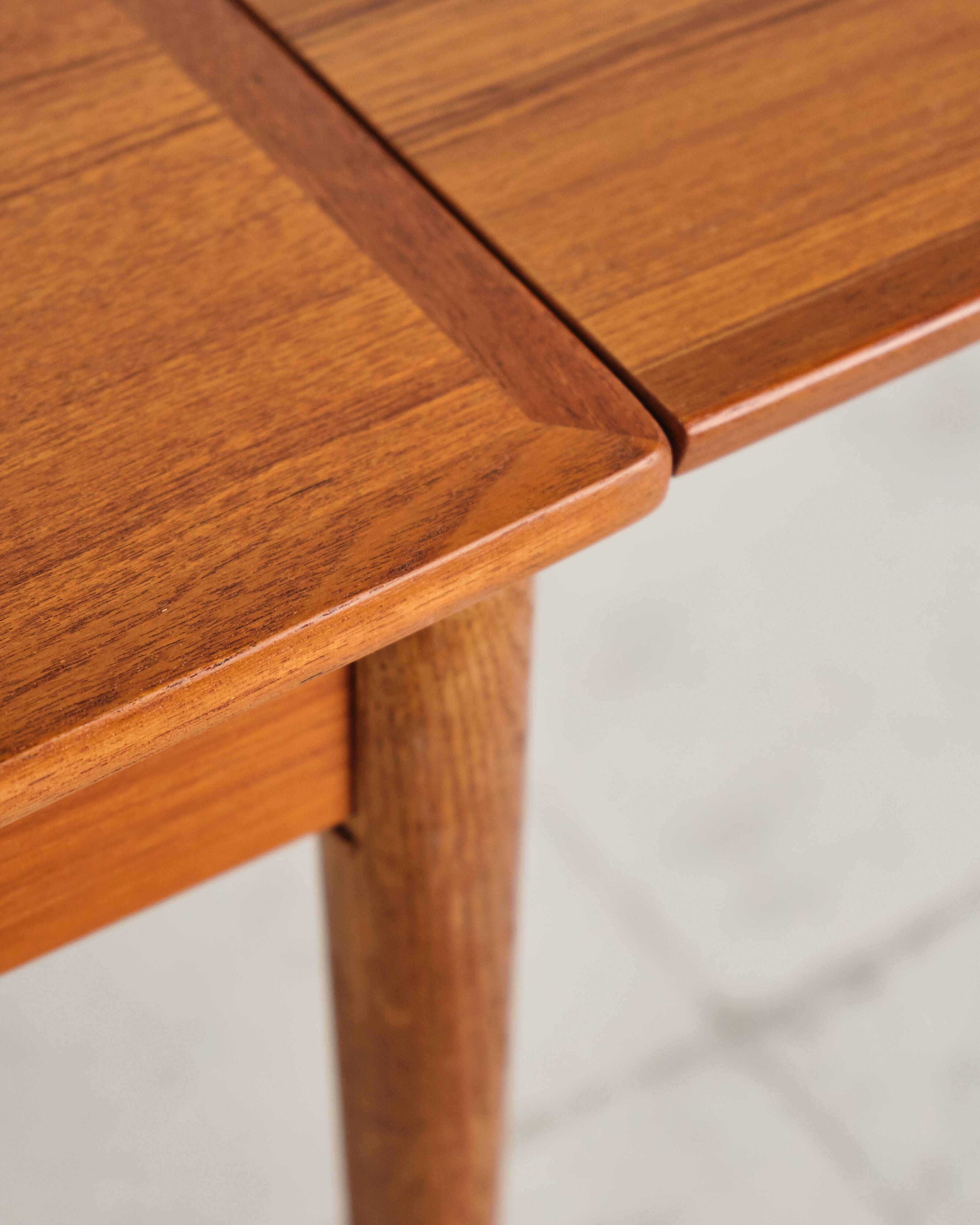 Extendable teak table by Poul Hundevad, Denmark