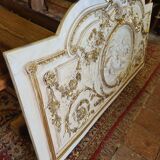 Pediment panel with stucco and wood angels