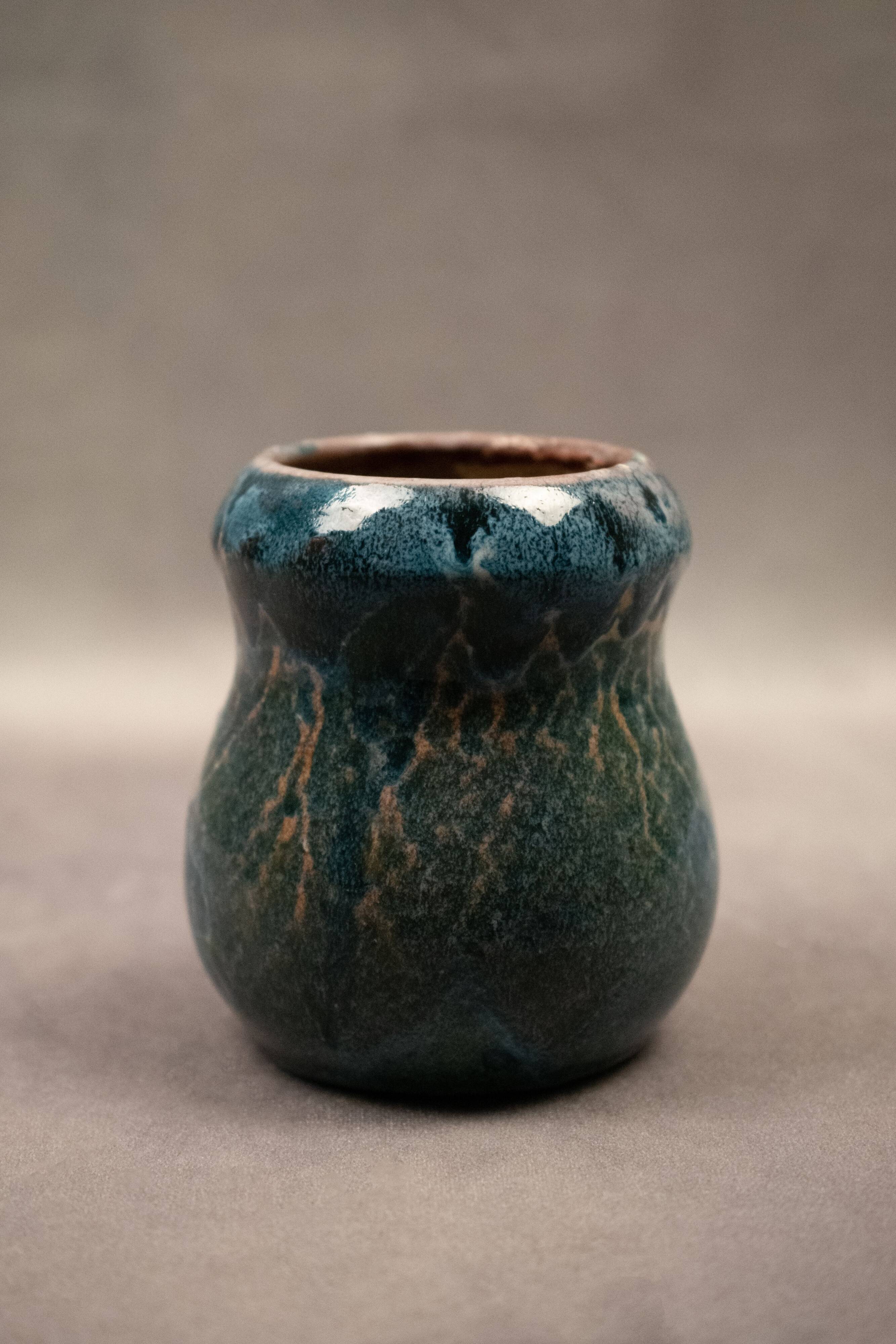 Small flamed stoneware vase in shades of blue and orange