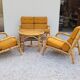 Living room sofa, 2 armchairs and a vintage rattan coffee table from the 1950s.