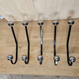 5 black and silver coat hooks from the 60s