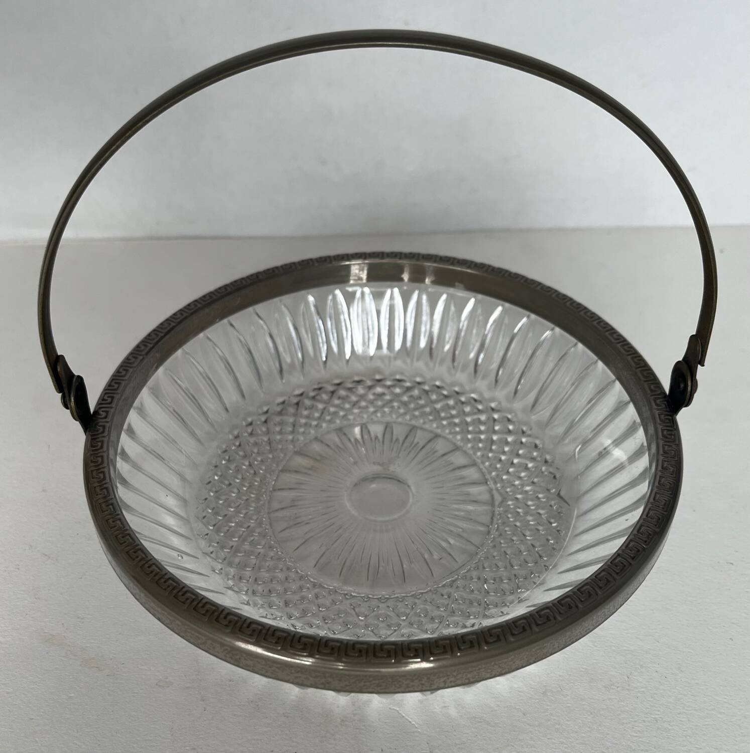 Antique glass cup with metal frame