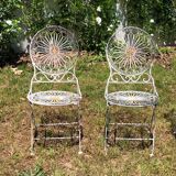 Ancient folded garden lounge in cast iron