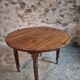Antique drop-leaf table in French walnut – Oval table with folding extensions on both sides, late 19th century.