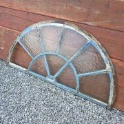 Old wrought iron full riveted gates from the 19th century.